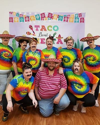 Staff members dressed up for fiesta night at Garden Place Waterloo in Waterloo, Illinois.