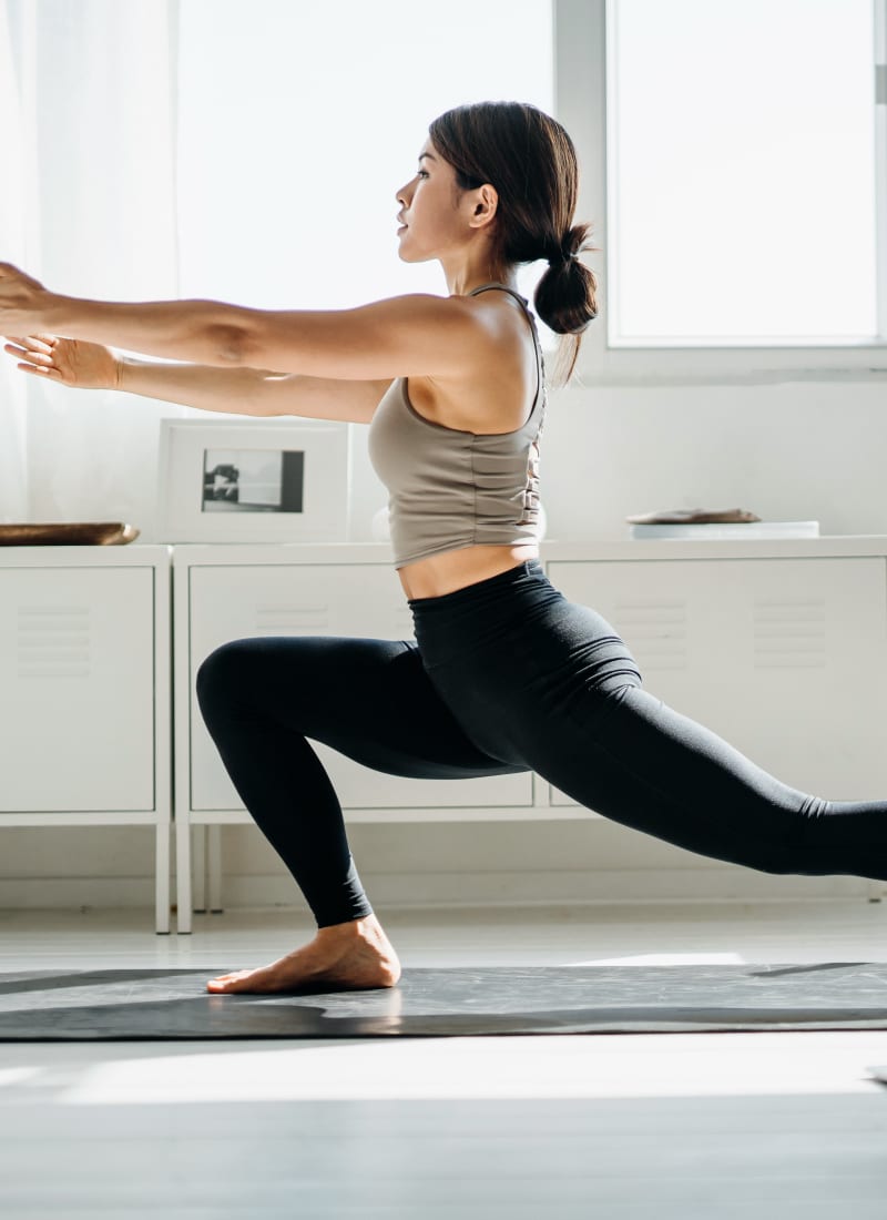 Resident doing yoga near Richmond, Texas from Marquis Grand Lakes