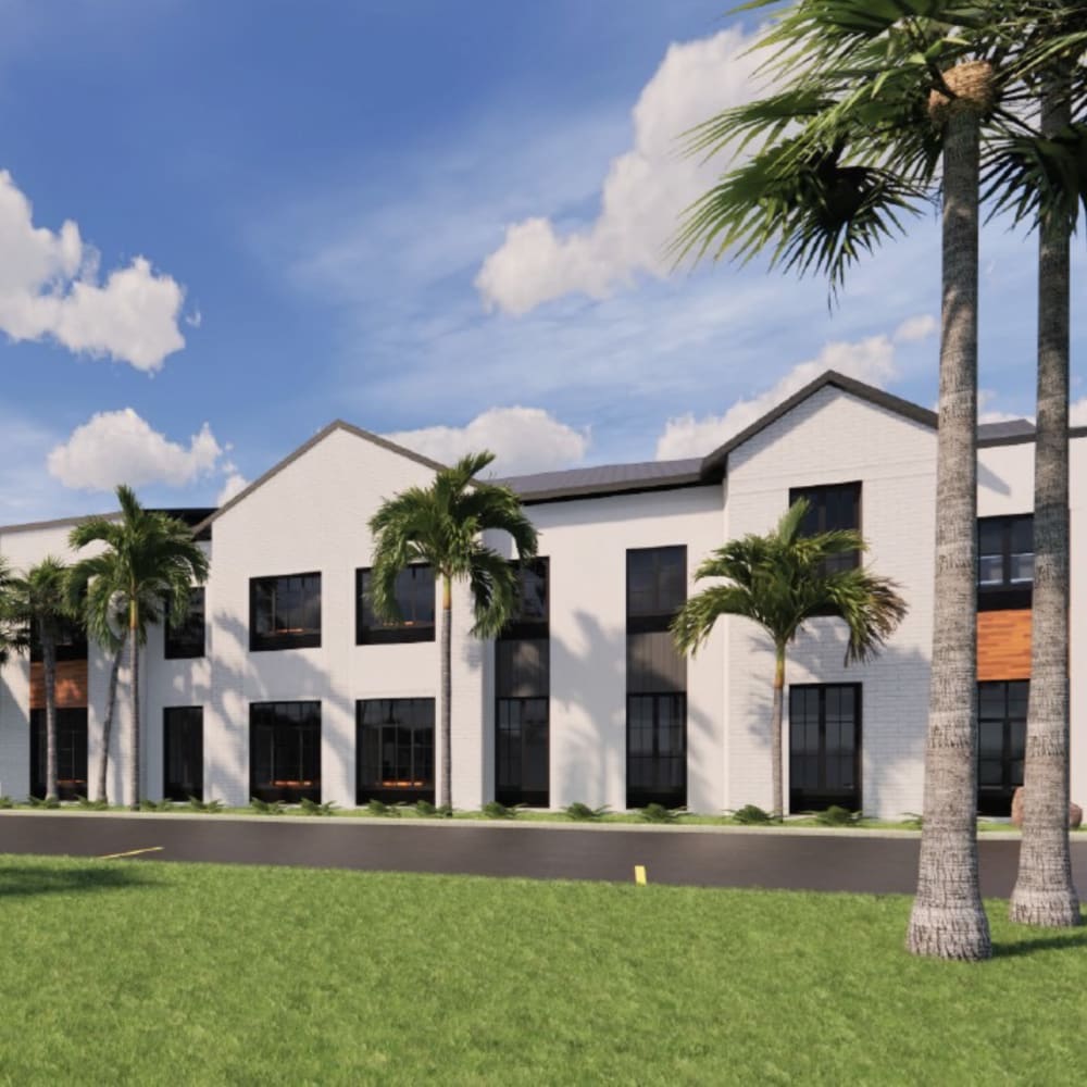 Exterior rending of building with palm trees at Anthology of Boynton Beach in Boynton Beach, Florida