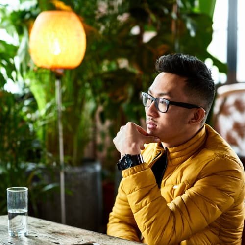 Resident waiting to meet a friend at a hip local restaurant near Solaire 8200 Dixon in Silver Spring, Maryland