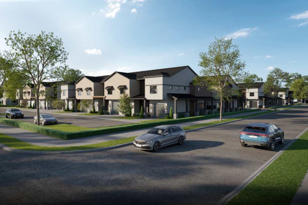 Townhomes exterior view with cars parked at Canyon Townhomes in Phoenix, Arizona