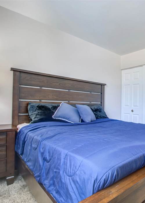 Bedroom with comfortable bed at Hidden Creek in Crown Point, Indiana