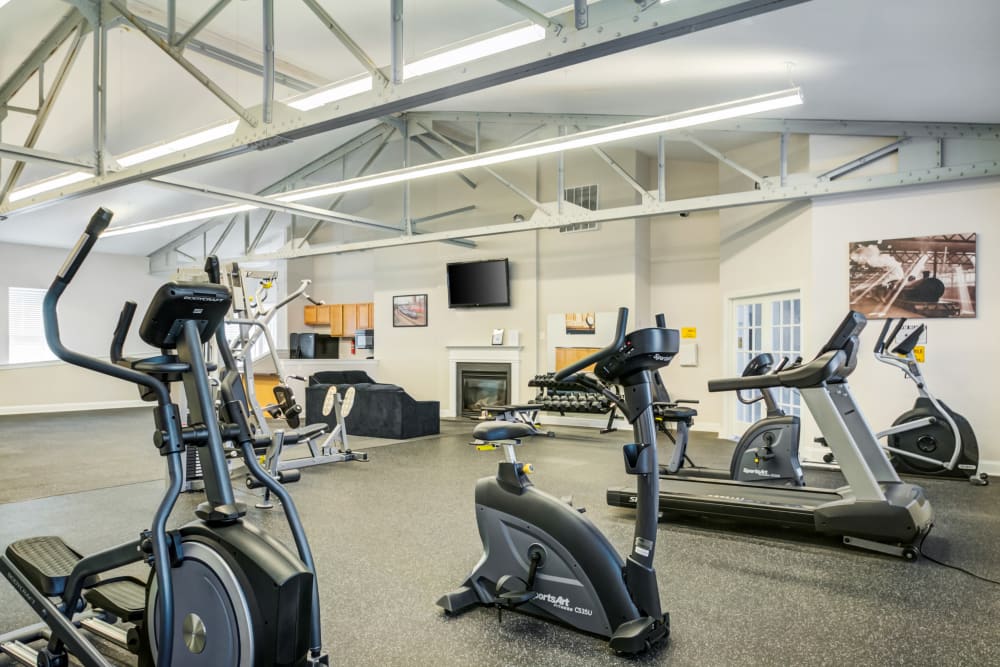 Gym with lots of equipment at Melrose Station Apartments in Elkins Park, Pennsylvania
