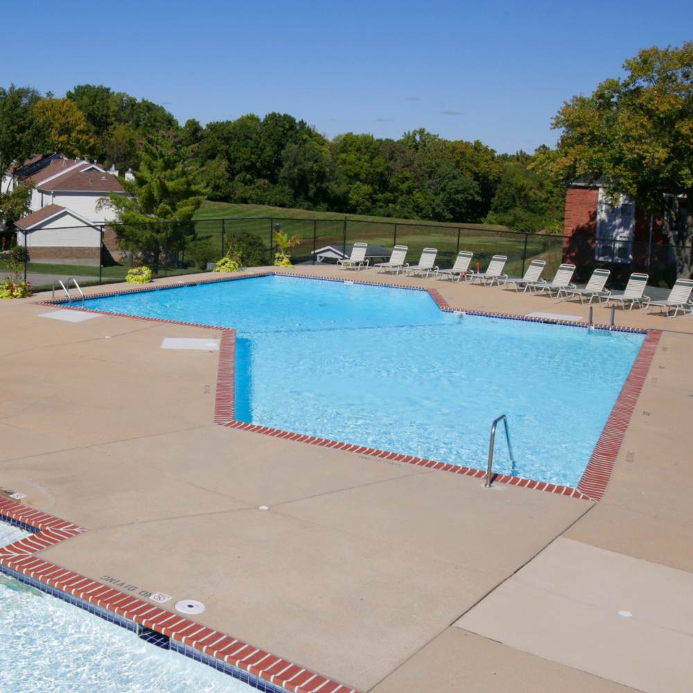 Outdoor swimming pool at Village Green Apartments in Chesterfield, Missouri