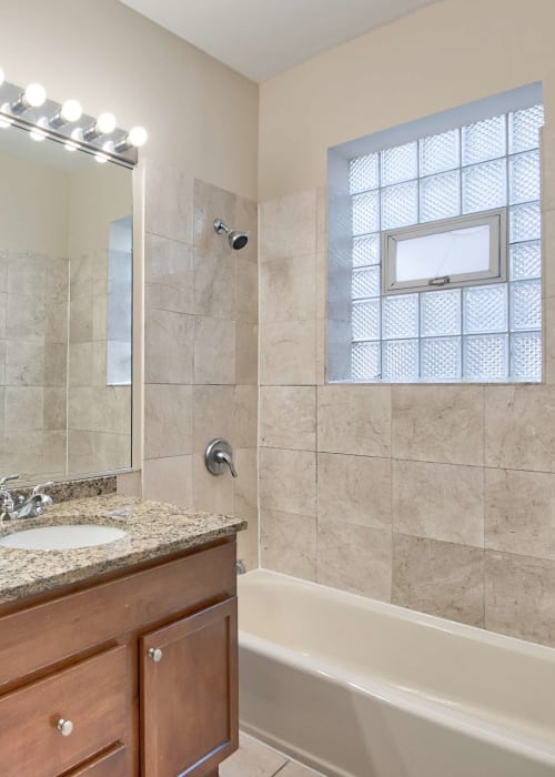 Bathroom with great lighting at The Maynard at 6351 N Lakewood in Chicago, Illinois