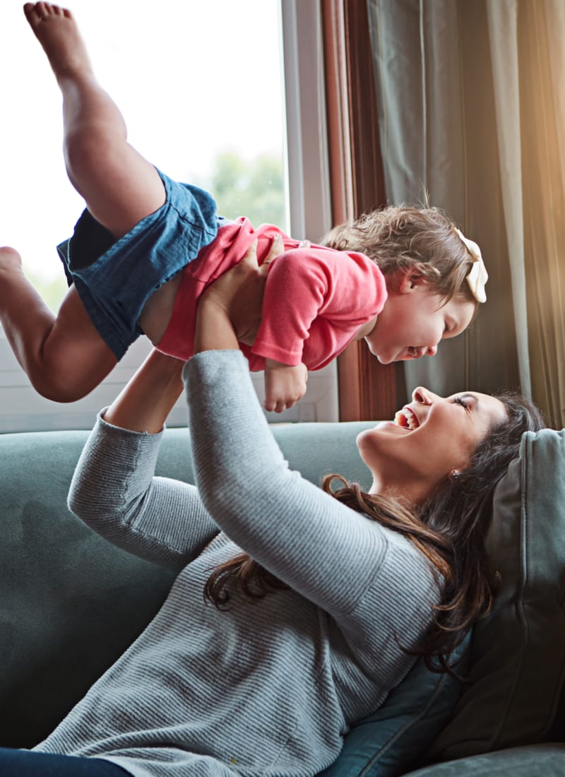 Resident playing with her daughter at Marquis at Desert Ridge in Phoenix, Arizona