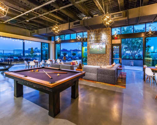 Clubhouse with billiards at The George Apartment Homes, Anaheim, California