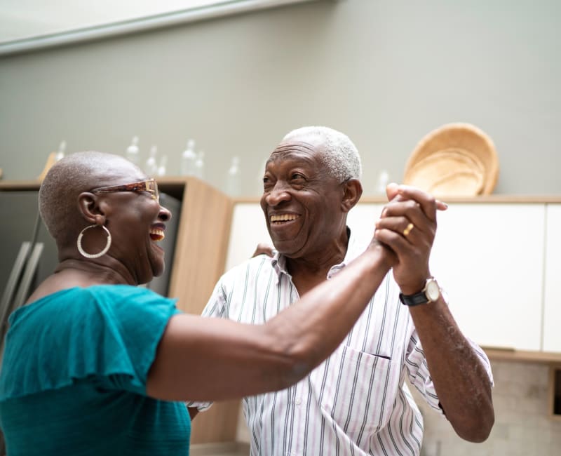 Resident couple dancing together at Arbor Glen Senior Living in Lake Elmo, Minnesota