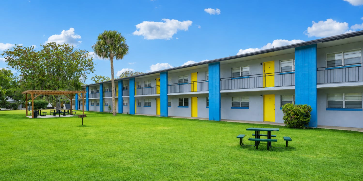 Apartment exterior with greenery at The Element At 464 in Daytona Beach, Florida