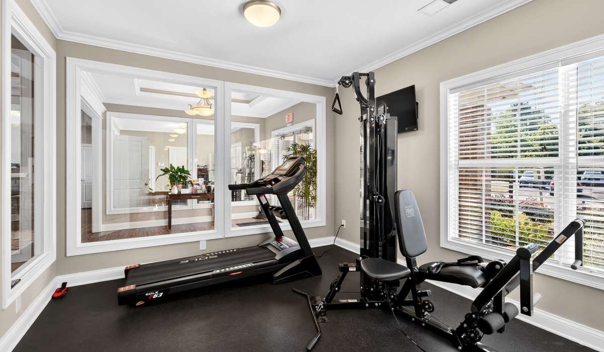 Fitness center with treadmill at Palomar View Apartments in Lexington, Kentucky