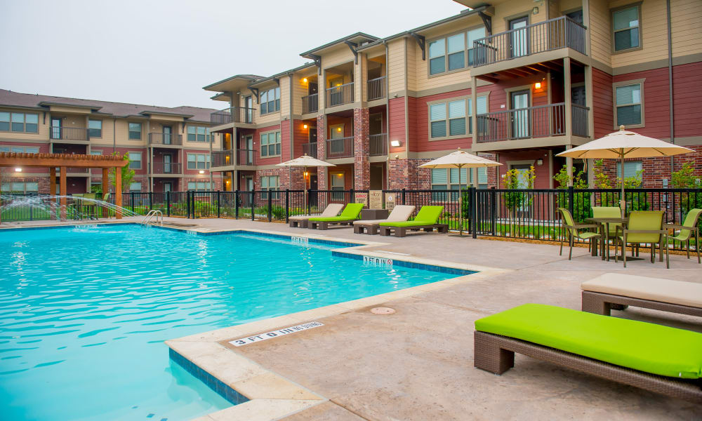 Poolside seating at Icon at Corpus Christi in Corpus Christi, Texas