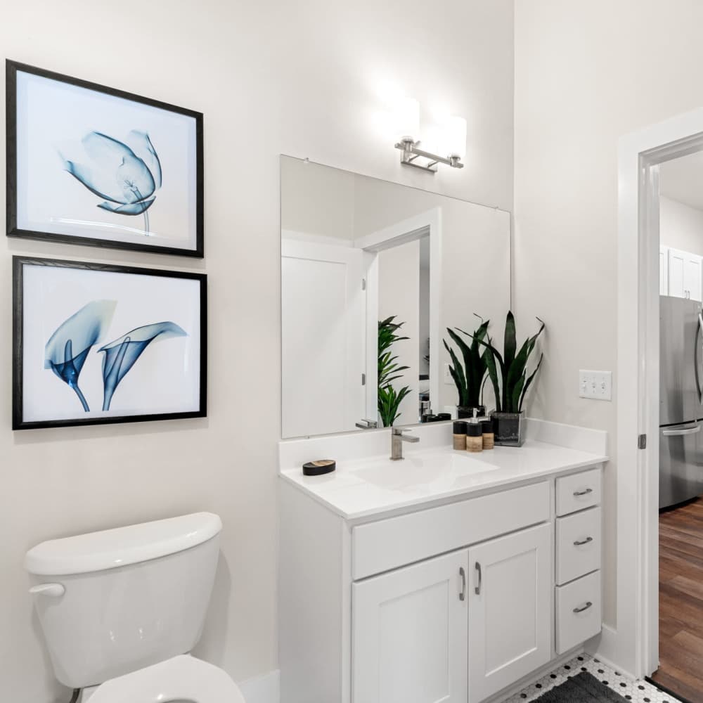 Bathroom with vanity mirror at Culver Street in Newington, Connecticut