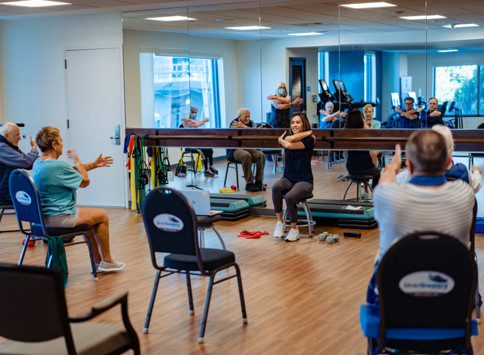 Employee teaching fitness class at Murano in Seattle, Washington