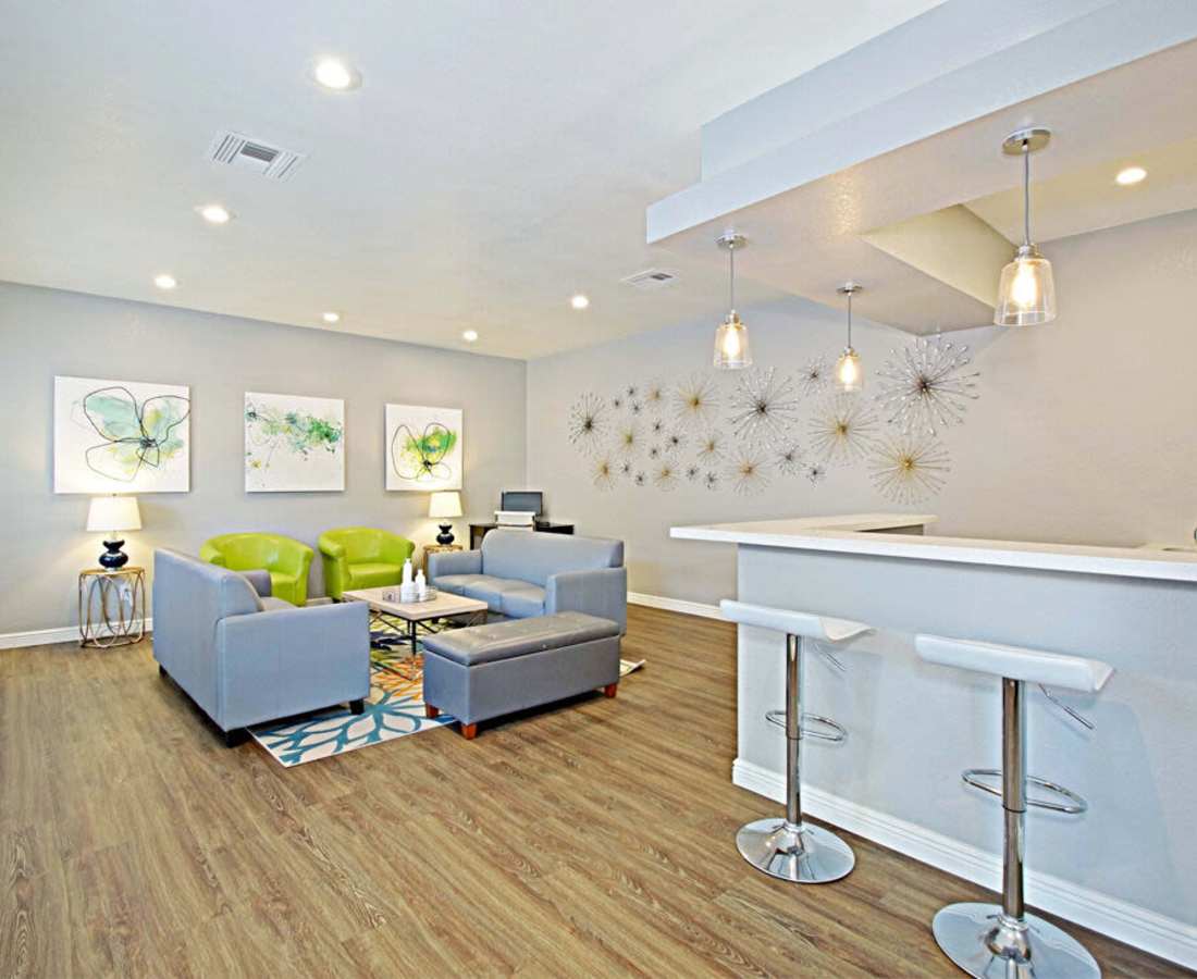 Clubhouse with an island kitchen and bar stools at 544 Southern Apartments in Mesa, Arizona