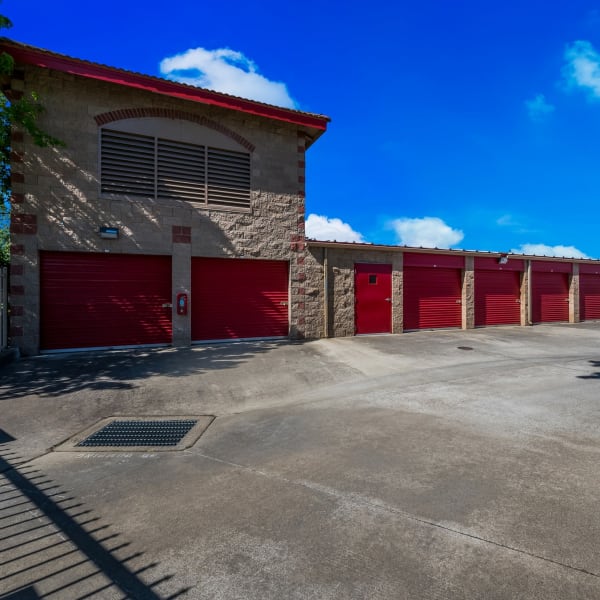 Outdoor drive-up storage units at StorQuest Self Storage in Elk Grove, California