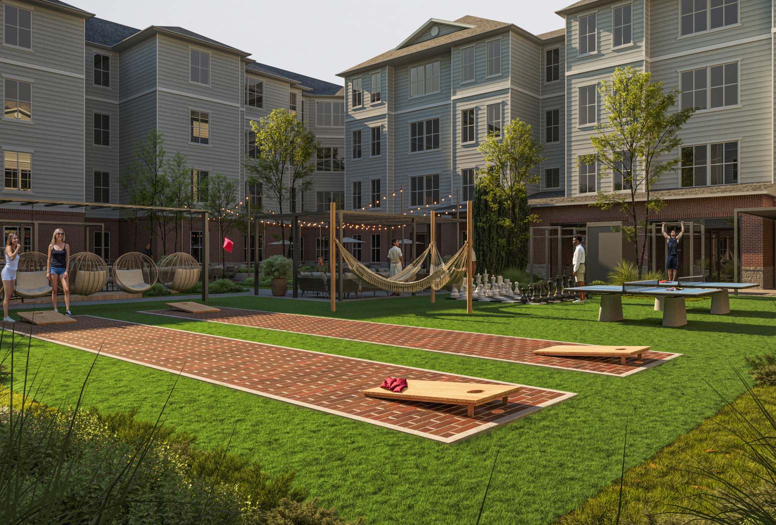 Lawn games area with cornhole, hammocks, and seating at Terra in College Park, Maryland