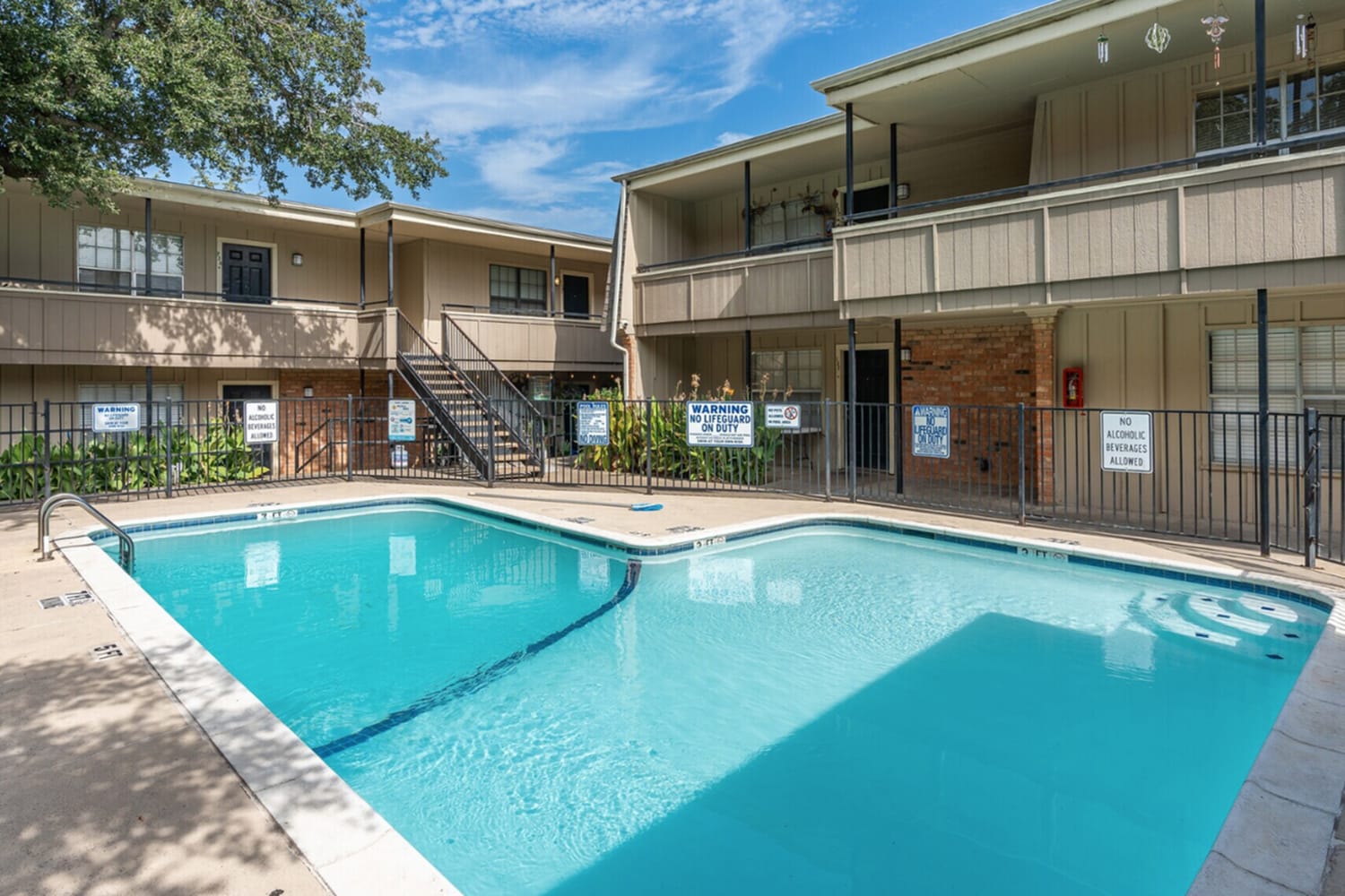 Serene swimming pool at Arbor Park Apartments in Hurst, Texas