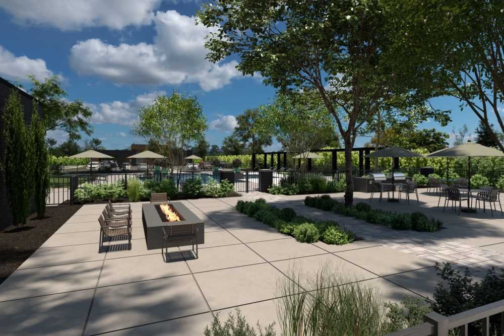Fire pit and and outdoor lounge space throughout MainLine Apartment Homes in Fredericksburg, Virginia
