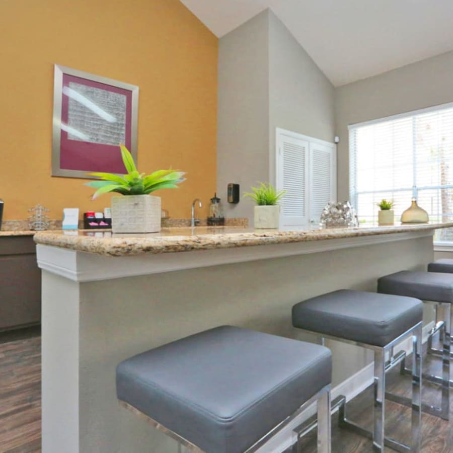 Common area for residents to mingle at Compass at Windmill Lakes in Houston, Texas