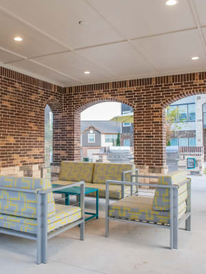 Outdoor seating at Bend at New Road Apartments in Waco, Texas