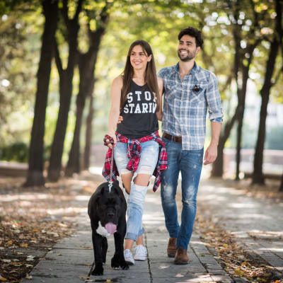 A residents with their dog at park near Adobe Flats I in Twentynine Palms, California