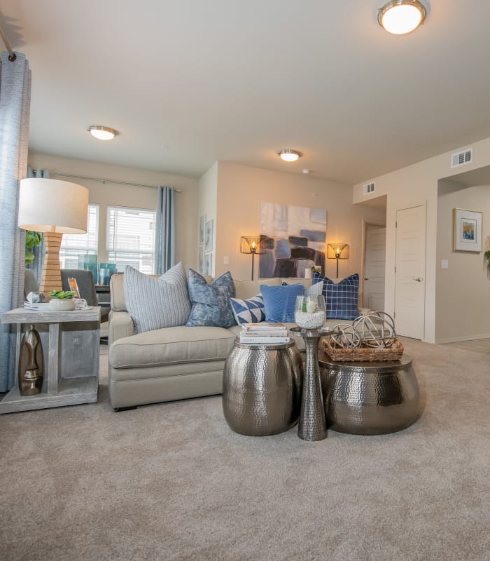 Living room at Bend at New Road Apartments in Waco, Texas