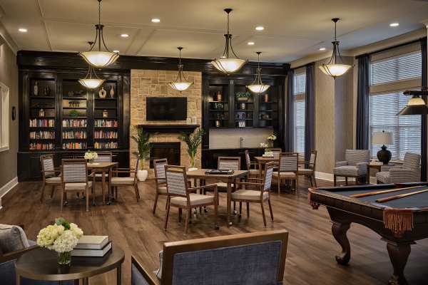 Game Room and lounge area at Waltonwood Providence in Charlotte, North Carolina