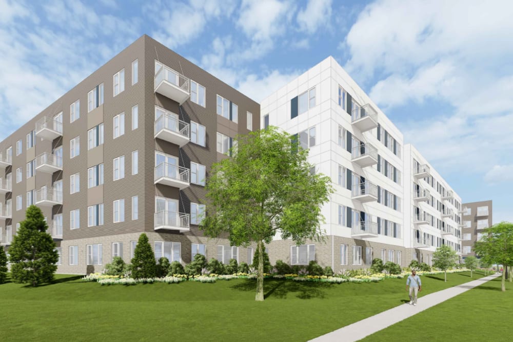 Beautiful exterior view with green lawn of the building  at The Intersect in Madison, Wisconsin