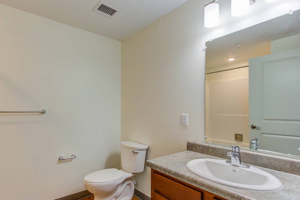 Bright bathroom with a modern sink at 43 Town Square in Lima, Ohio