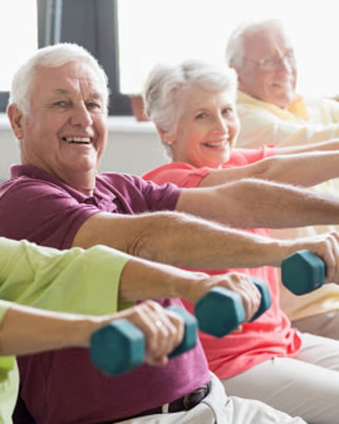 Residents working out at fitness center at The Springs at Anna Maria in Medford, Oregon