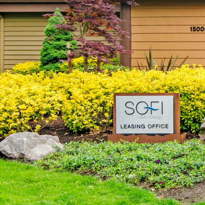 Professionally maintained landscaping outside the leasing center at Sofi Lake Oswego in Lake Oswego, Oregon
