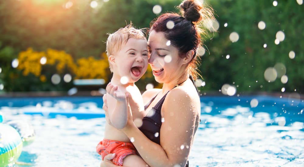 Mom and son swimming at GoodHomes Detroit in Detroit, Michigan