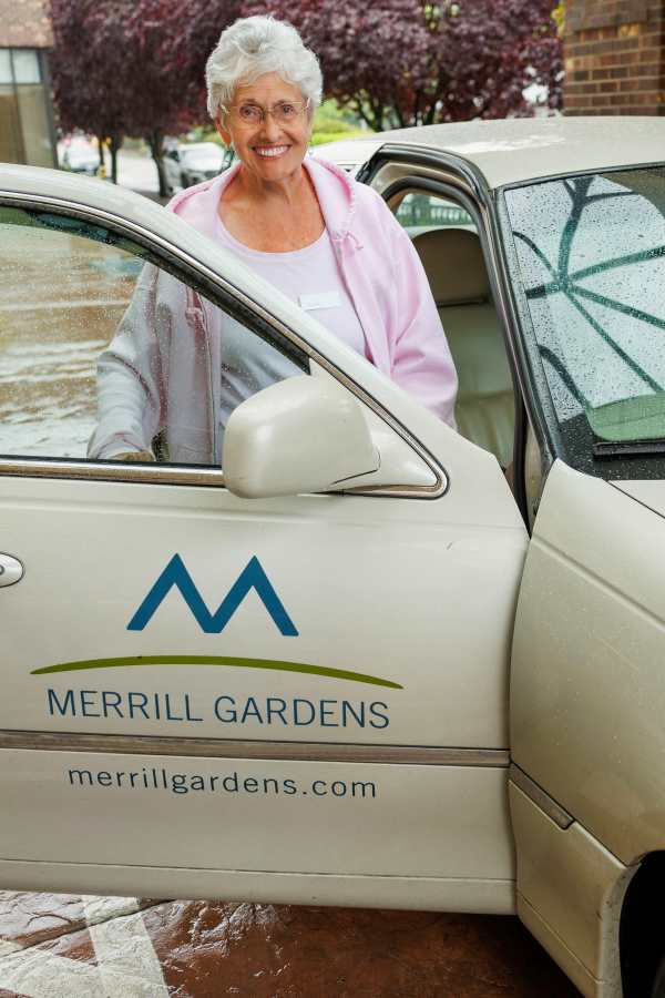 Resident getting into community car | Merrill Gardens in Seattle, Washington