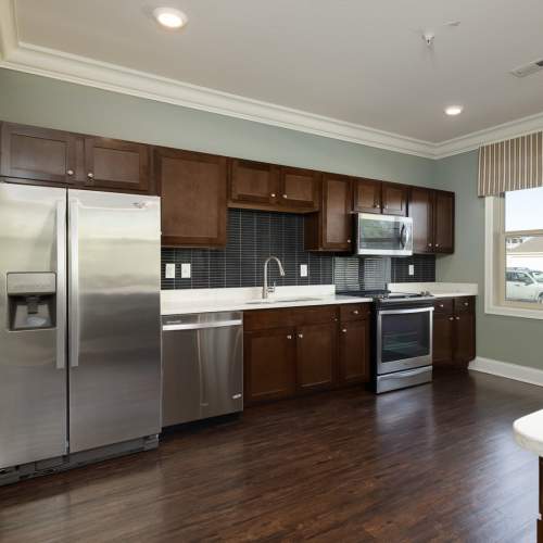 Gourmet kitchen with stainless-steel appliances at University Commons in Williston, North Dakota