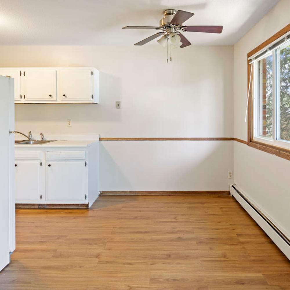 Dining area connected to kitchen at Solace on Lake Minnetonka in Spring Park, Minnesota