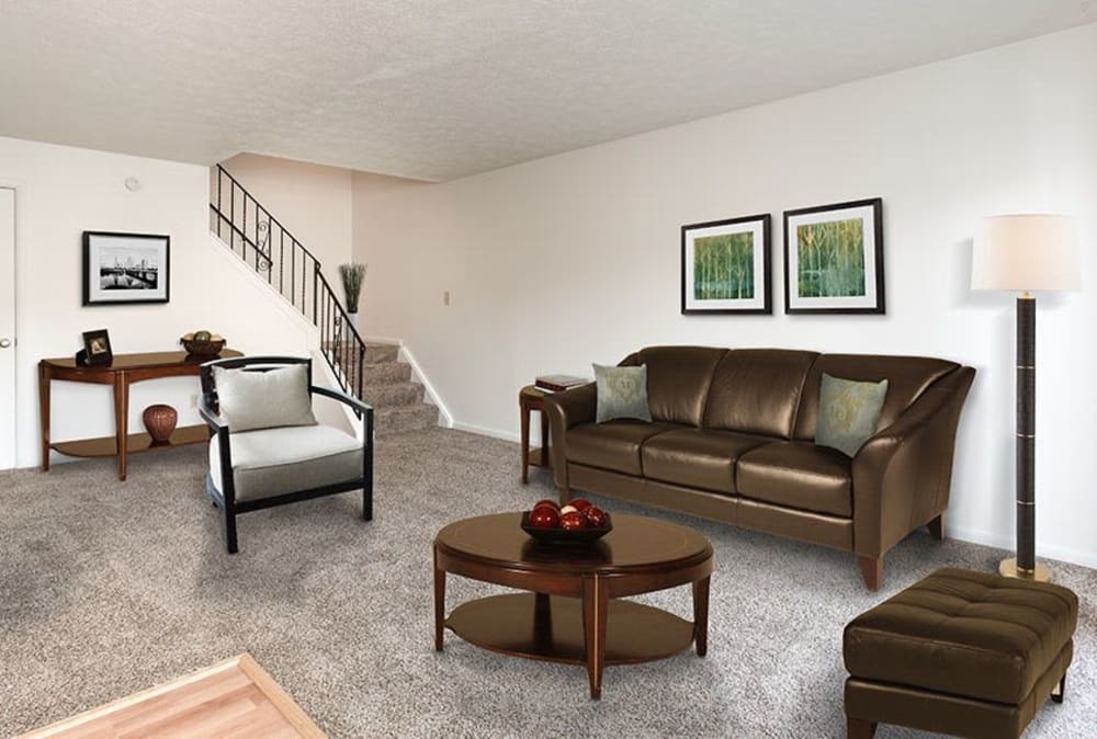 Living room in a home at Brighton Colony Townhomes in Rochester, New York