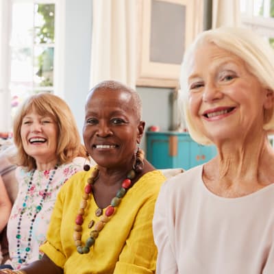 Resident friends pose for a picture at Aurora on France in Edina, Minnesota. 