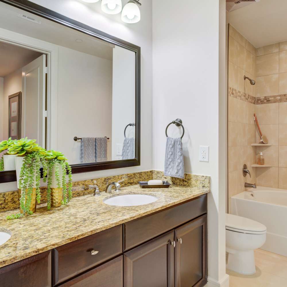 Bright bathroom at Hollings Post Oak in Houston, Texas.