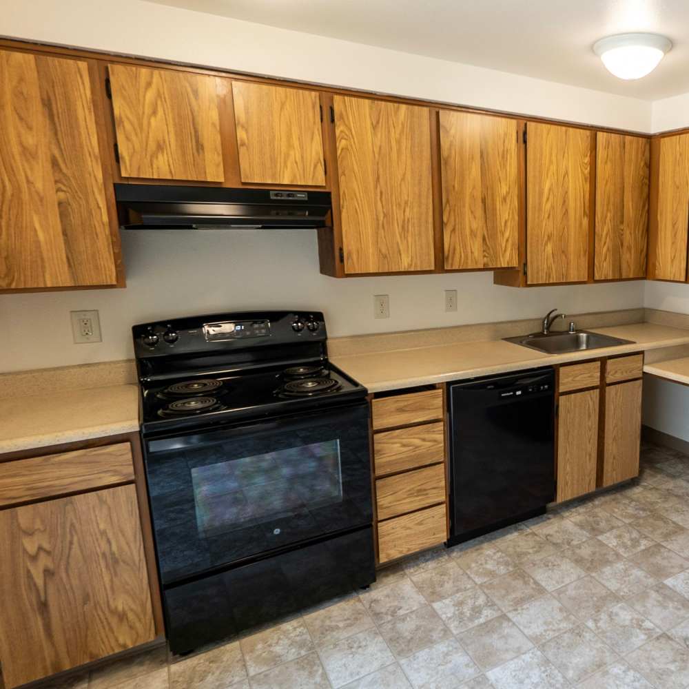 Model apartment kitchen angle 1 Park Green Apartments in Tacoma, Washington