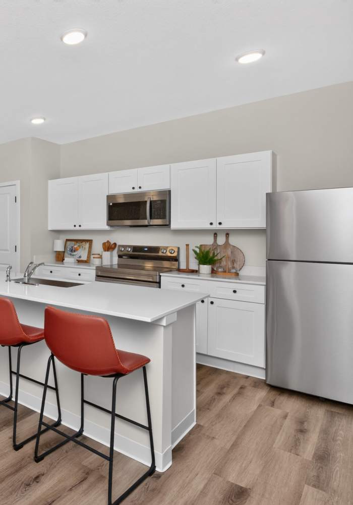 kitchen with eating bar at Northpark Row in Huxley, Iowa