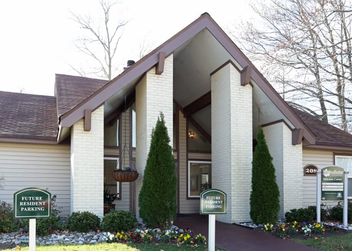 Exterior view of welcome center at Woodbriar Apartments in Chesapeake, VA