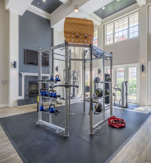 A weightlifting station in the fitness center at Evergreens at Mahan in Tallahassee, Florida