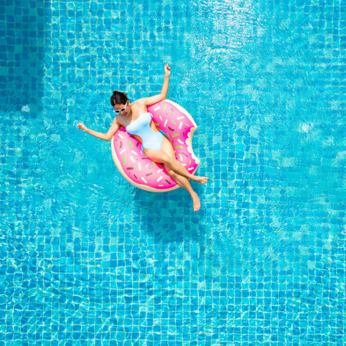 A resident floating in the pool at Mosby Bridge Street in Huntsville, Alabama