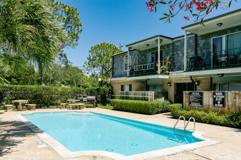 A beautiful swimming pool at Brittany Place Apartments in Houston, Texas