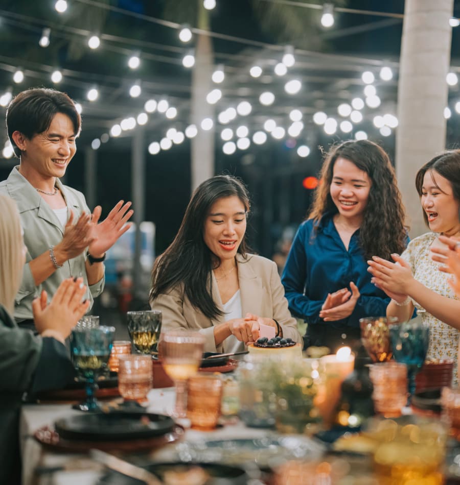 Residents getting dinner together near The Margaret at Riverfront in Dallas, Texas