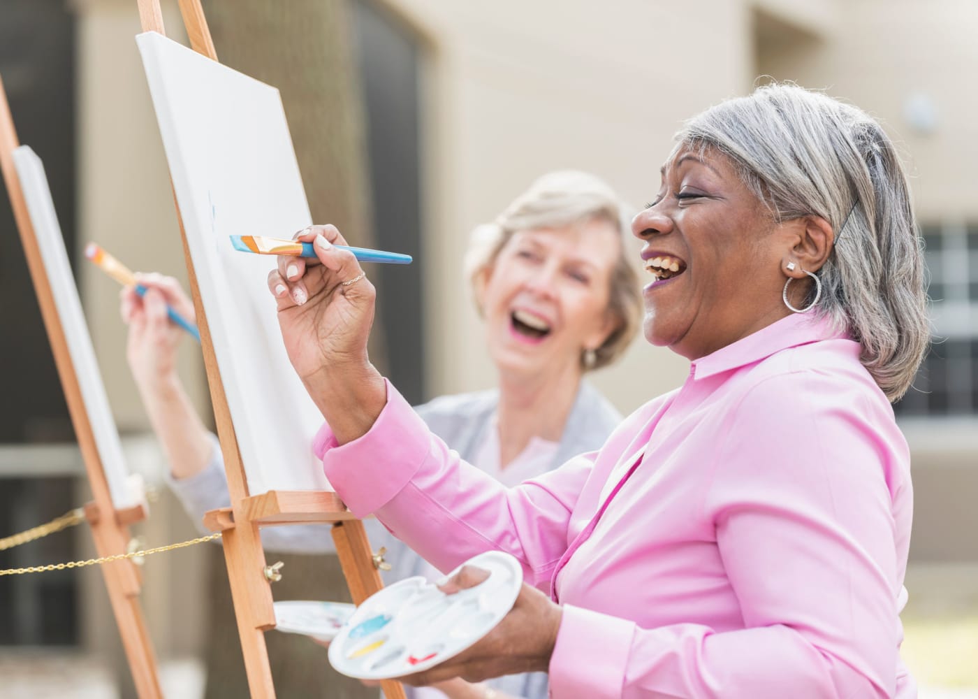 Residents painting at The Claiborne at McComb in McComb, Mississippi.