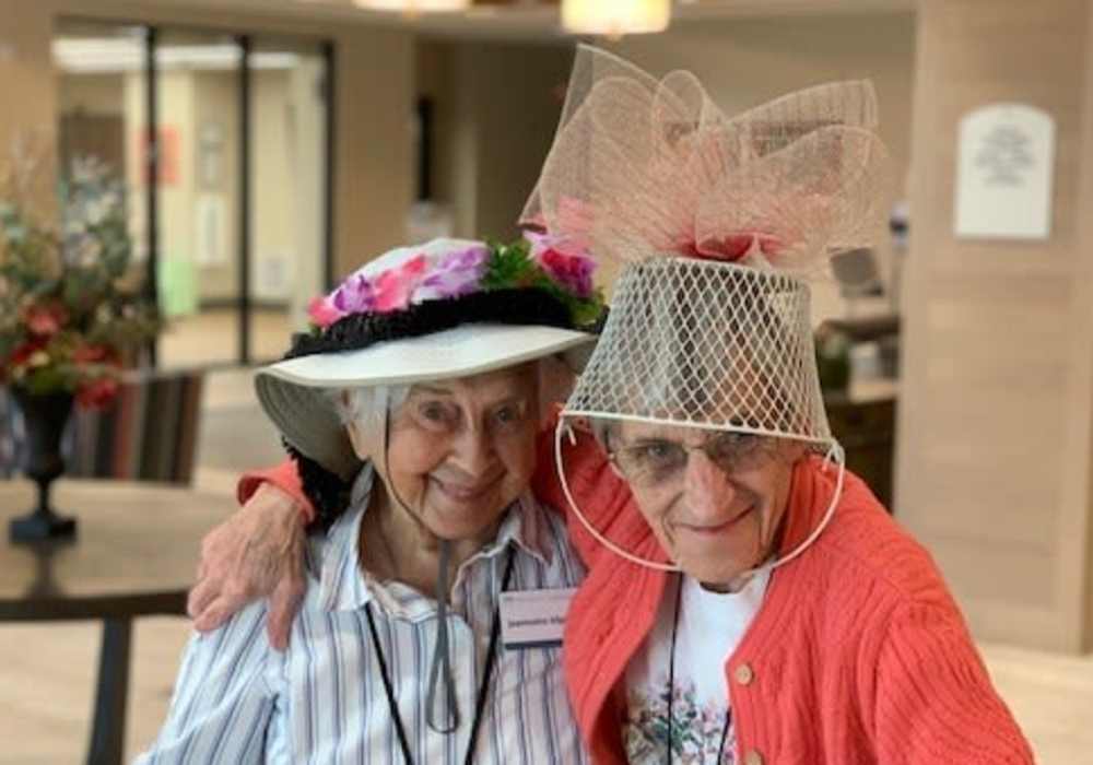 Residents Wearing Flashy Hats at Merrill Gardens at Wright Park in Tacoma, Washington