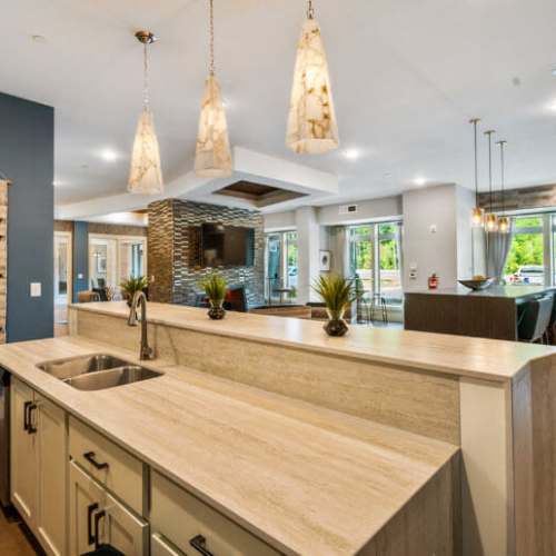 Clubhouse sink with granite cabinets at Lodge at Lake Wylie in Lake Wylie, South Carolina