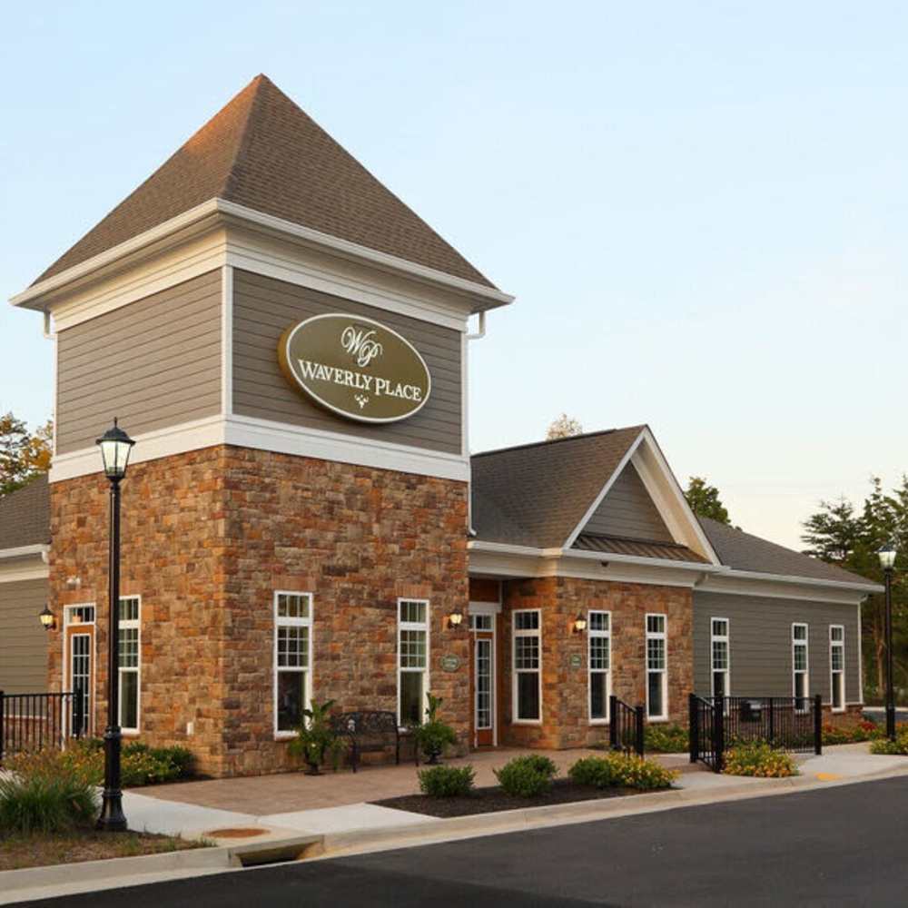 Clubhouse exterior with stone accents at Waverly Place in Louisa, Virginia