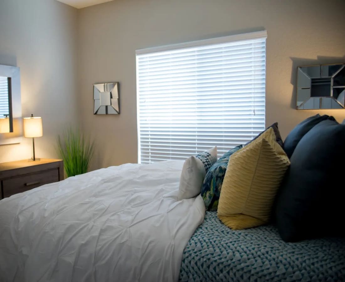 Furnished model bedroom at Waterford Place in Folsom, California